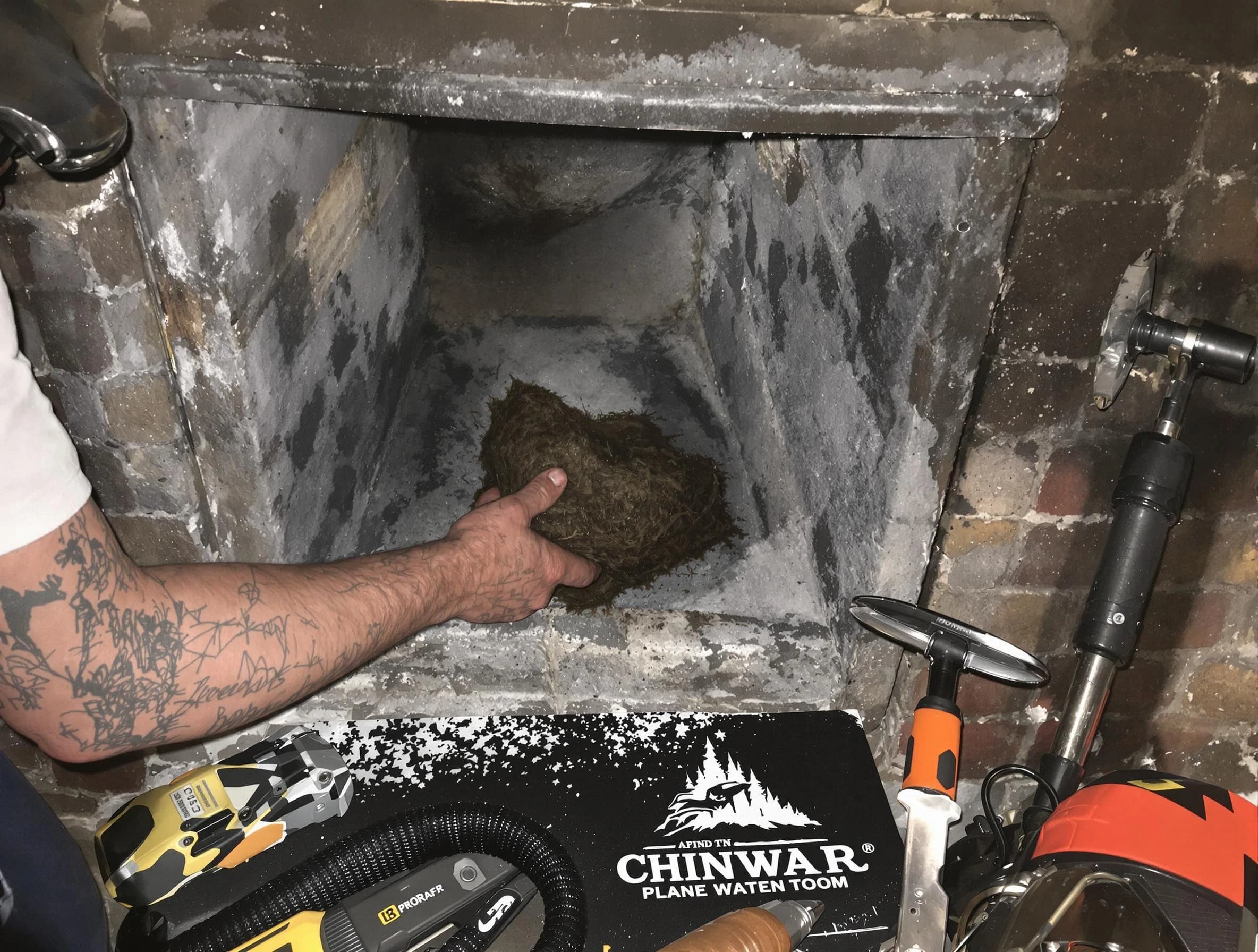 Bernards Chimney Sweep safely removing debris and screening chimney in Bernards, NJ